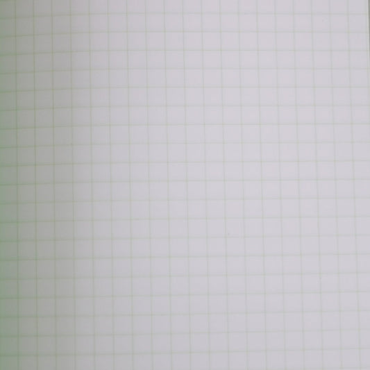 open pistachio life notebook with green grid