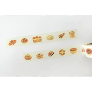 Suatelier 712 bread washi tape unrolled showing croissant and bread illustrations — 15mm wide