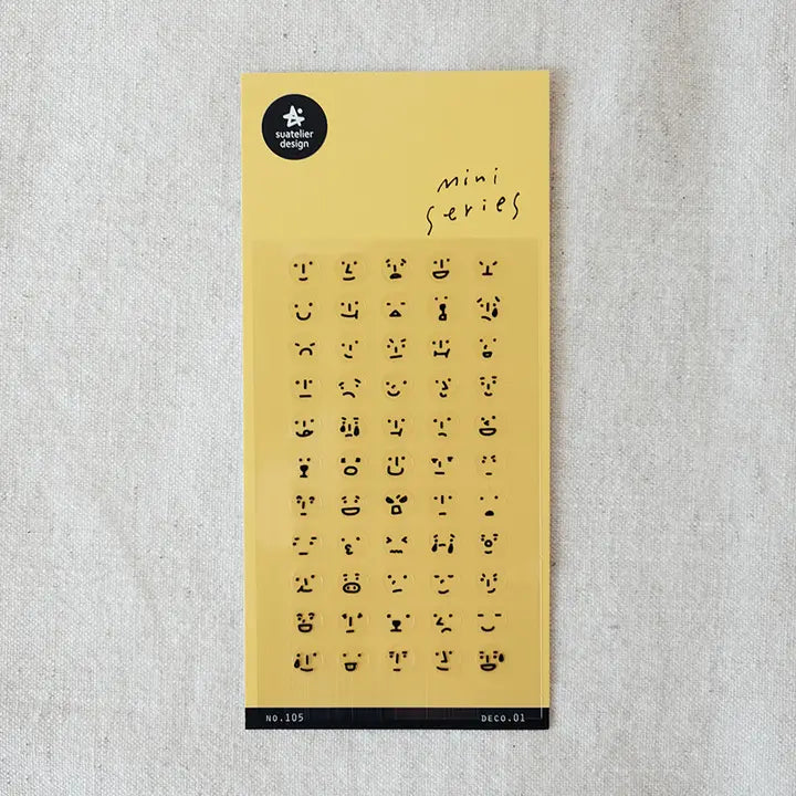 Suatelier No.105 Deco.01 Moods is a mini sticker sheet packed with tiny illustrated faces displaying different emotions and moods on  a white background