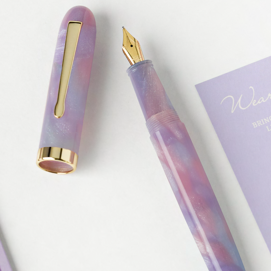 wearingeul a dream within a dream purple fountain pen on a white background