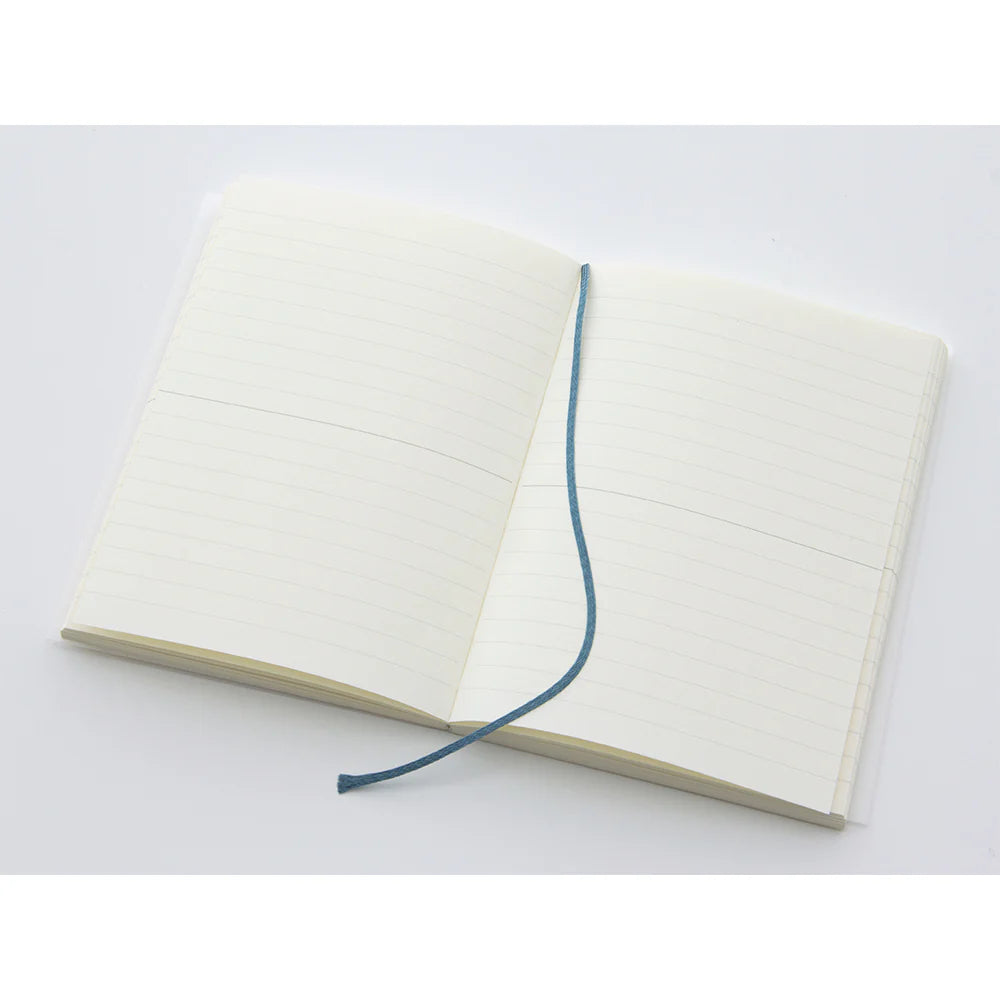 MD notebook open showing lined pages and lay-flat spiral binding with blue ribbon