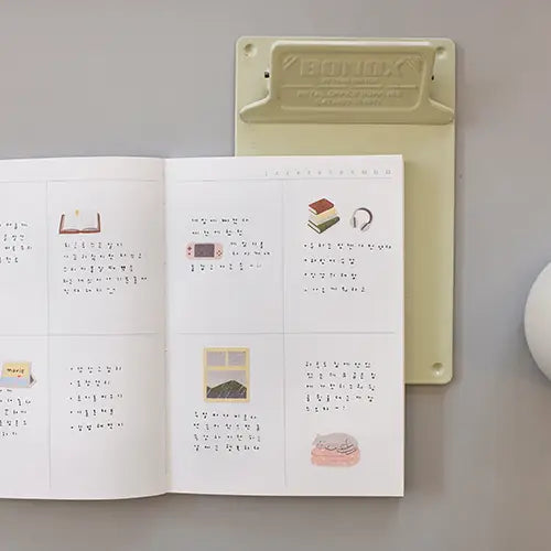Suatelier No.1171 Lazy Sunday sticker set in a planner.
