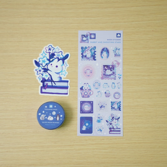 Thousand Skies Celestial Rabbit Bundle — washi tape, washi sticker sheet, and vinyl sticker flat lay on wood background