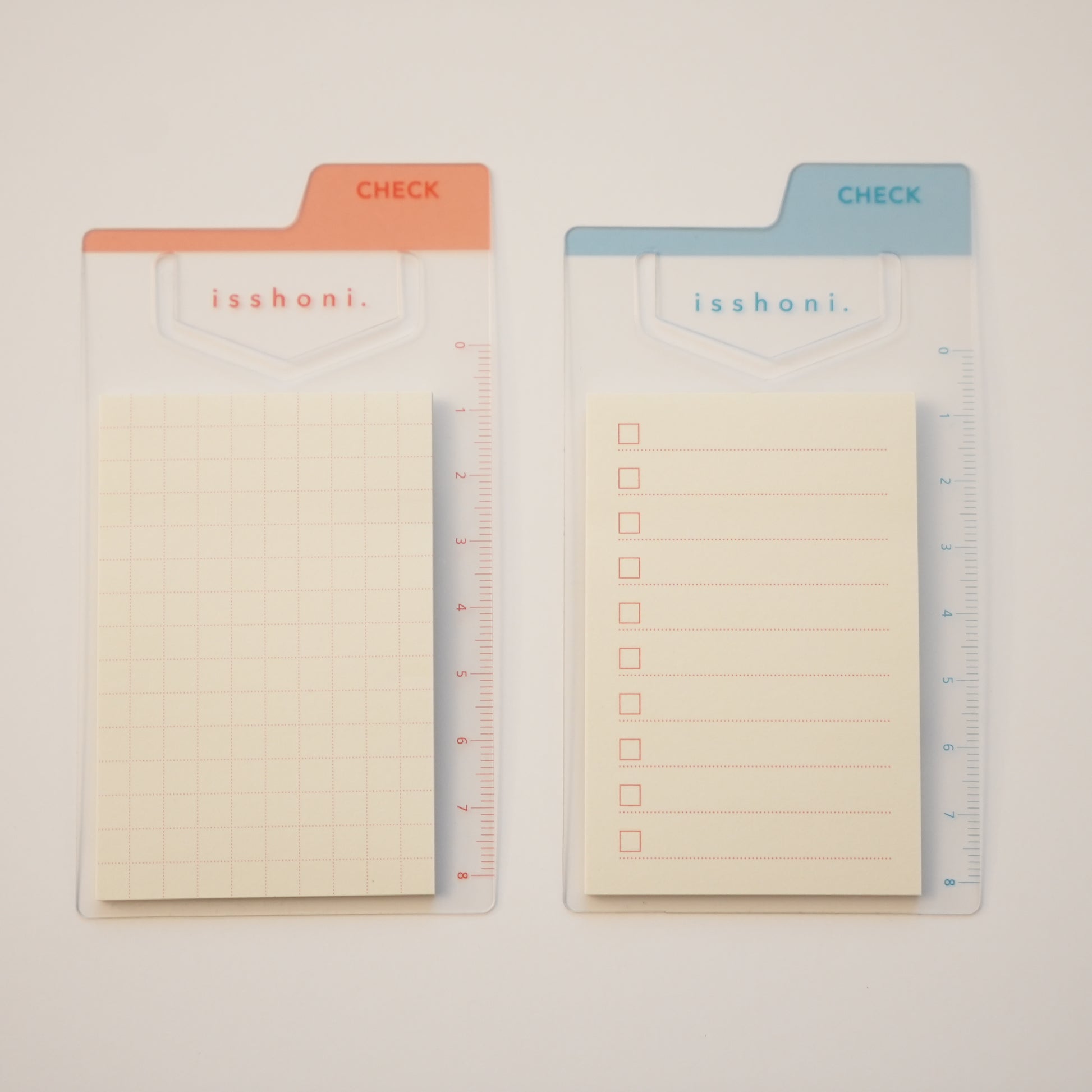 Isshoni. Bookmark Index Sticky Notes mini. One mounted on a blue ruler bookmark with a to-do list, the other mounted on a red ruler bookmark with red grid paper.