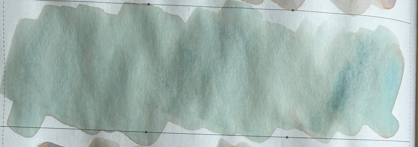 a swatch of Kitty Inkpot coconut meow meow roll