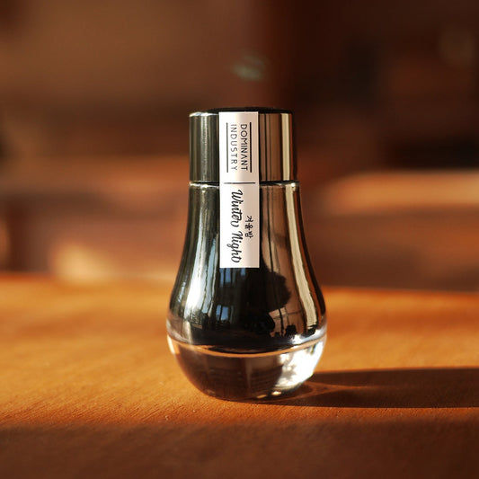 Dominant Industry Winter Night fountain pen ink. Deep blue-black with purple shimmer and brown sheen from the Pearl Series. 25m. 