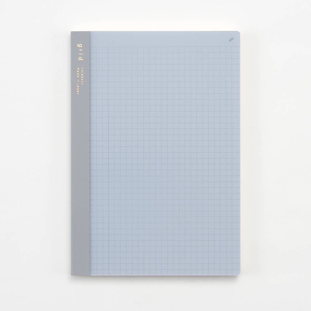 Isshoni A5 grid numbered notebook showing grid pages and cover in blue