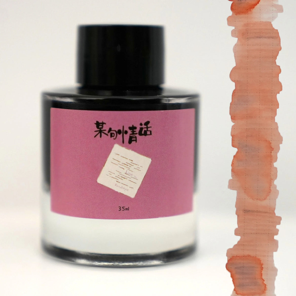 Kitty Inkpot A Certain Love Story bottle with an ink swatch next to it