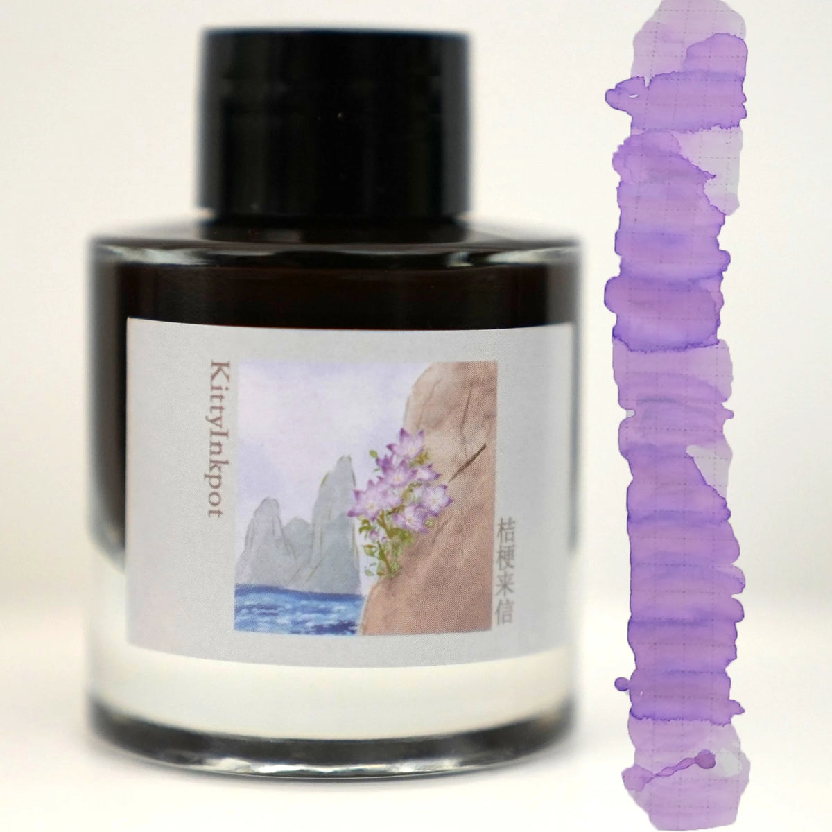 Kitty Inkpot Letter from Platycodon bottle with an ink swatch next to it