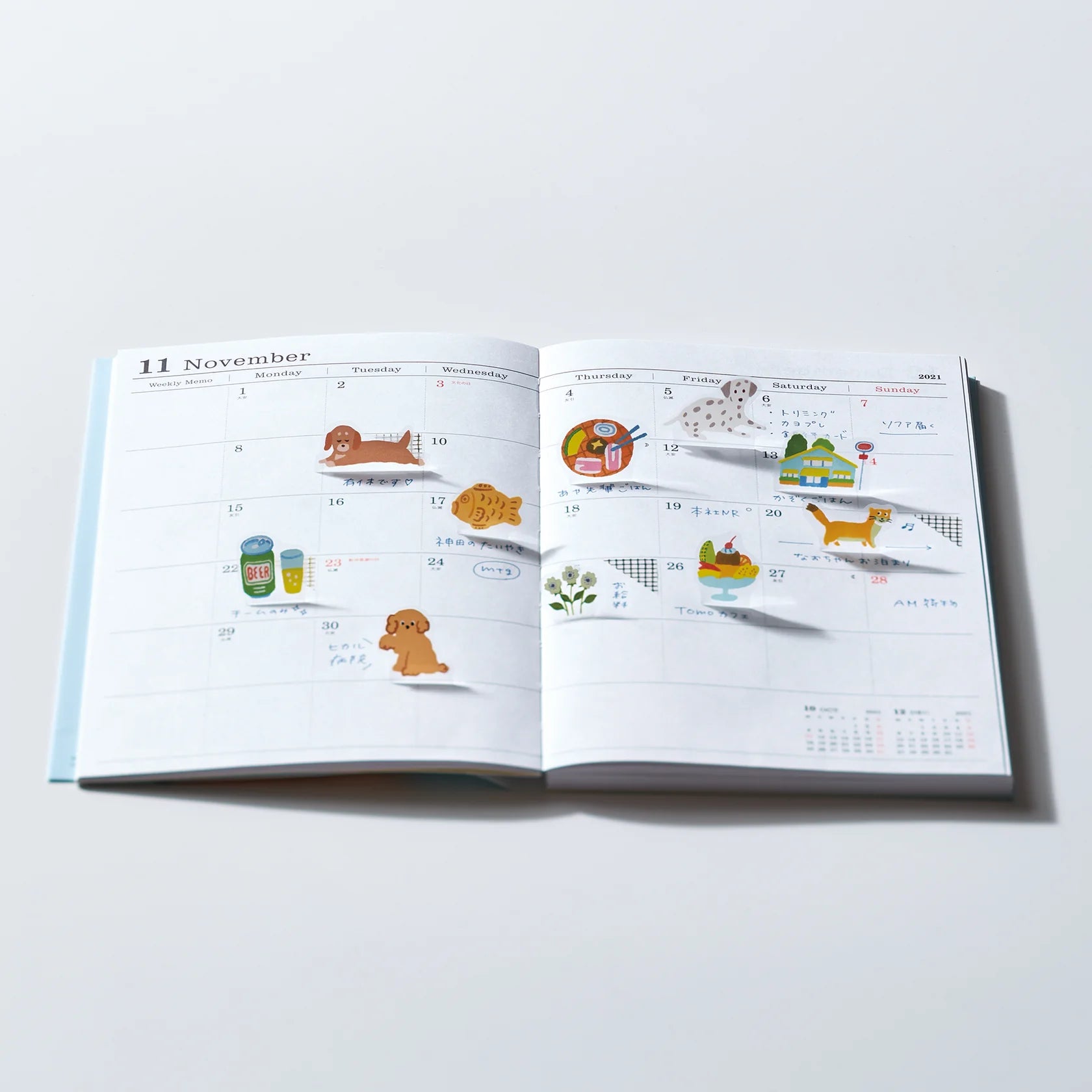 Hitotoki Pop Up Stickers in a planner spread to show whimsy