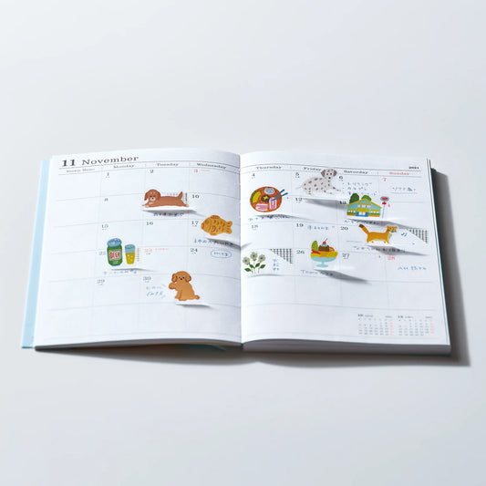 Hitotoki Pop Up Stickers in a planner spread to show whimsy